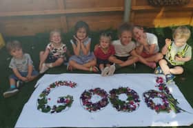 Children at Tops Nursery celebrate after their 'Good' Ofsted rating. 