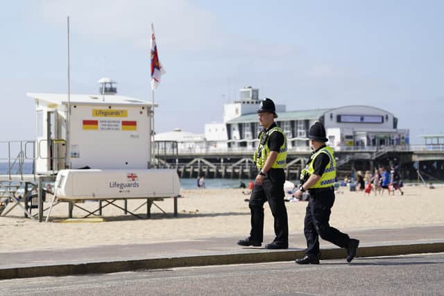 Police say there is 'no suggestion' of people jumping from Bournemouth pier or of jet skis being involved in the tragedy.

(Photo: Andrew Matthews/PA Wire)