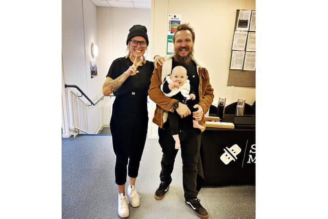 Lex Cuppleditch, 37, and Tom Ellis, 41, from Squidmoo with their daughter Florence