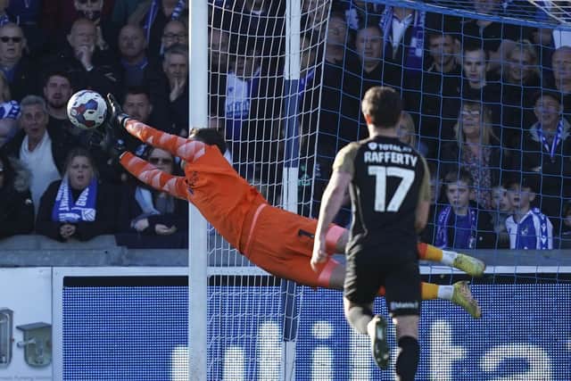 Matt Macey makes one of his string of saves.