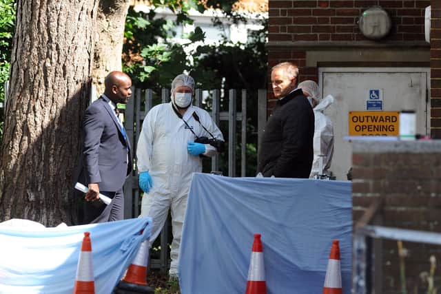 Pictured is: Forensic officers and detectives inspecting the scene.

Picture: Sarah Standing (030720-5352)