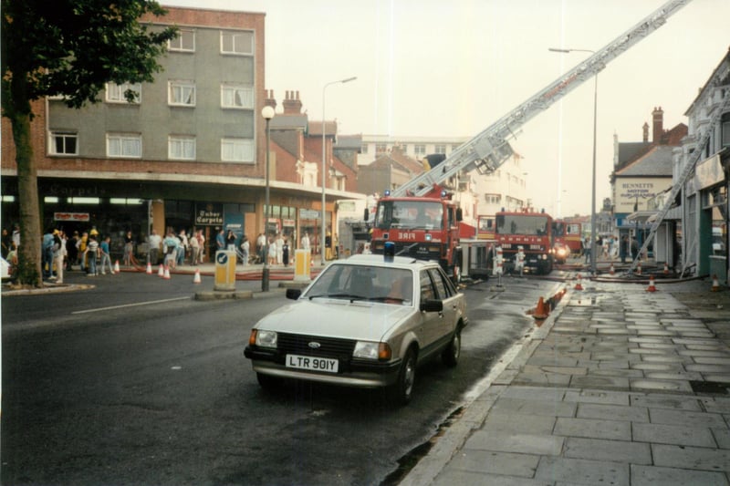 Firefighters at the scene of an emergency in the 1980s. Captured by Steve Spurgin