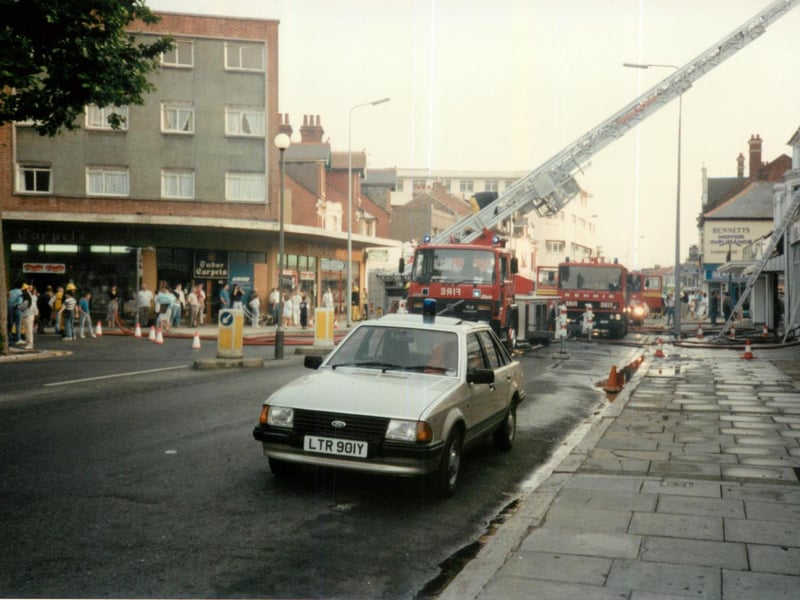 Firefighters at the scene of an emergency in the 1980s. Captured by Steve Spurgin