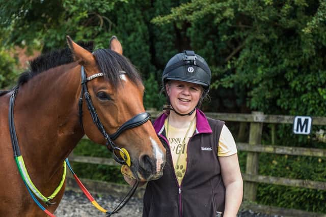 Zoe Hanscombe with horse Hugo at Catherington Equestrian Centre Picture: Mike Cooter (020721)
