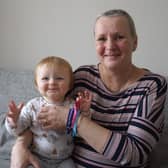 Carole Smith from Fareham with her first grandchild Frankie who was being born at the QA Hospital at the same time Carole was undergoing a biopsy to reveal whether or not she had developed breast cancer. Picture: Cancer Research UK