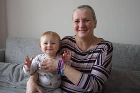 Carole Smith from Fareham with her first grandchild Frankie who was being born at the QA Hospital at the same time Carole was undergoing a biopsy to reveal whether or not she had developed breast cancer. Picture: Cancer Research UK