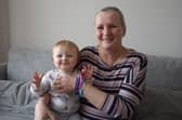 Carole Smith from Fareham with her first grandchild Frankie who was being born at the QA Hospital at the same time Carole was undergoing a biopsy to reveal whether or not she had developed breast cancer. Picture: Cancer Research UK