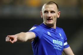 MILTON KEYNES, ENGLAND - MARCH 08: Will Boyle of Cheltenham Town in action during the Sky Bet League One match between Milton Keynes Dons and Cheltenham Town at Stadium mk on March 08, 2022 in Milton Keynes, England. (Photo by Pete Norton/Getty Images)