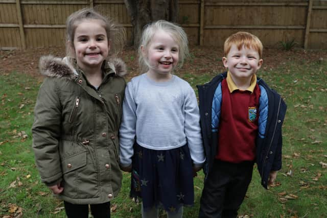 Children from Growing Places nurseries visited their friends at local nursing homes to give them gifts just before lockdown. Pictured: Young visitors Payton Marshall, Hope Goodson and Caleb Tier