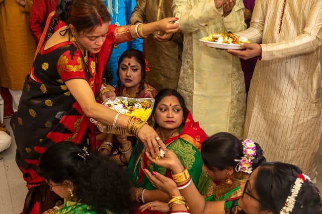 Flower petals distributed at Diwali. Picture: Mike Cooter (041121)
