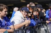These fans patiently wait to meet their favourite players