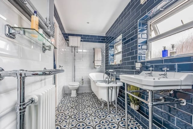 The listing says: "Easily one of the most surprising, deceiving and fantastic homes I’ve ever listed... This extended four bedroom detached chalet home, occupies a plot and a half, with the current owners having brought an additional garden... Creating the party space and garden of dreams."