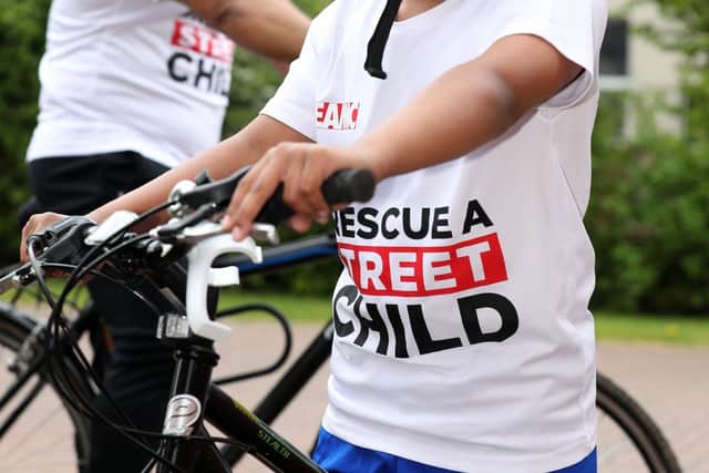 Local GP, Ebadur Chowdhury and his 10 year old son Amaan Chowdhury are cycling 200 kilometers to raise money for a charity that provides for Bangladeshi street children. 
Picture: Sam Stephenson