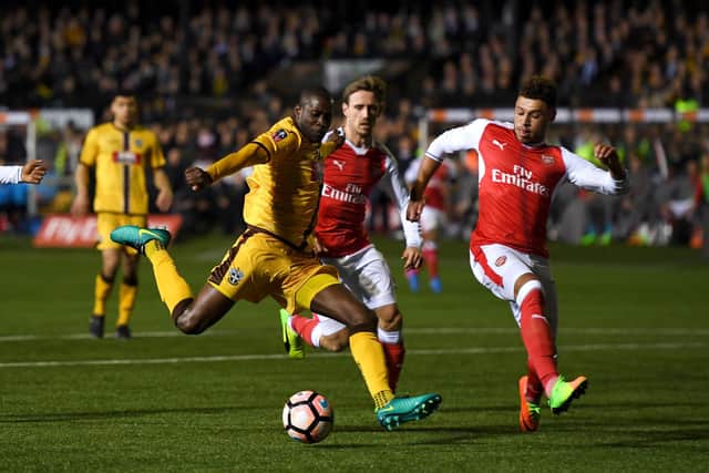 New Gosport signing Bedsente Gomis in action for Sutton against Arsenal in the FA Cup fifth round in 2017. Photo by Mike Hewitt/Getty Images.