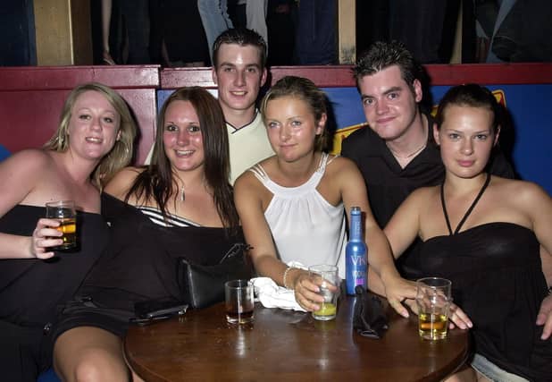 Revellers having a good time at the Route 66 nightclub in Guildhall Walk, Portsmouth - (043813-0008)