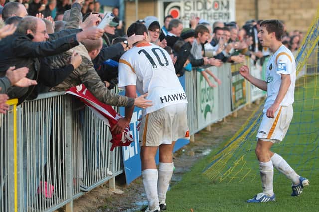 Mustafa Tiryaki celebrates scoring Hawks' second goal against Histon in 2010. Fellow goalscorer Wes Fogden is also pictured. Pic: Dave Haines