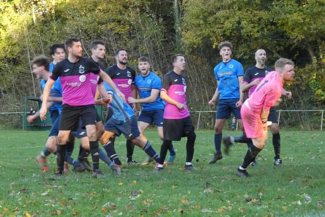 Harvest keeper  Bobby Read, right, is beaten for Liss' second goal in the 2-2 draw. Picture by Simon Jasinski.
