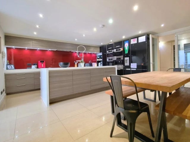 The listing says: "It provides a secure yet peaceful seclusion within the heart of the city and is yet within only a few minutes walk of the vibrant shopping district of Palmerston and Marmion Roads, the historic waterfront and highly regarded schools including Portsmouth Grammar, St. Johns College and the High School."