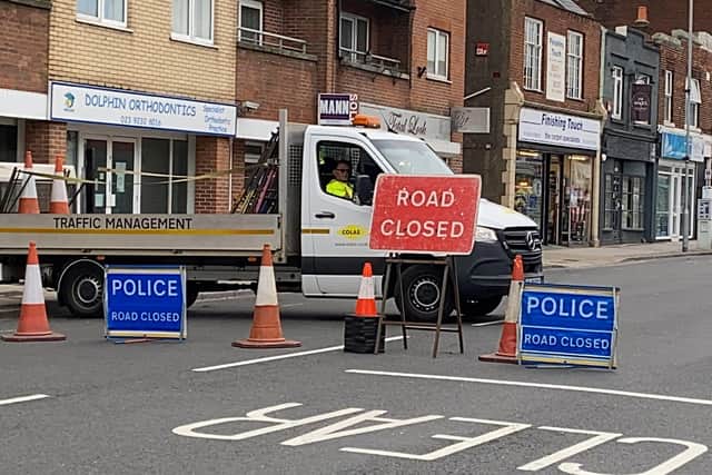 Police at the scene where a pedestrian was hit by a van at the junction of Vectis Way and High Street, Cosham in Portsmouth, on October 7, 2021. Picture: Tom Cotterill