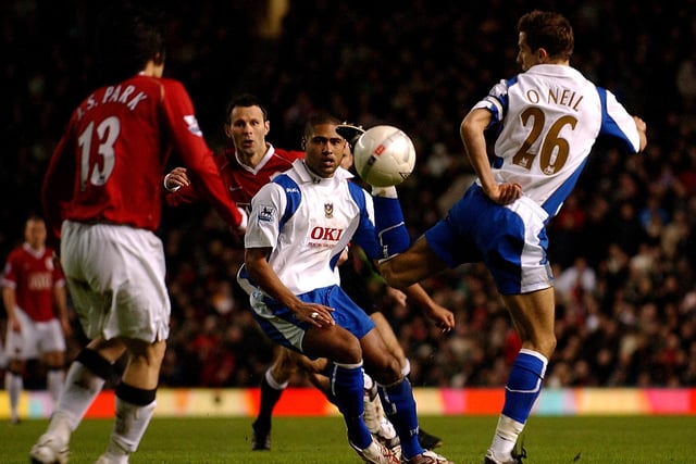 Glen Johnson and Ryan Giggs look on as Gary O'Neil flicks the ball past Park Ji Sun in Pompey's FA Cup Fourth Round 2-1 defeat at Old Trafford in January 2007. Picture: Jonathan Brady