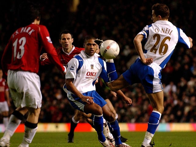 Glen Johnson and Ryan Giggs look on as Gary O'Neil flicks the ball past Park Ji Sun in Pompey's FA Cup Fourth Round 2-1 defeat at Old Trafford in January 2007. Picture: Jonathan Brady