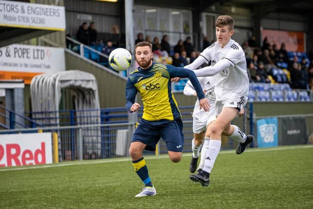 Moneyfields' Josh Hazell in a race for possession against Portland. Picture by Alex Shute