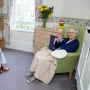 Jennifer Holland, 71, and mother Maisie Hider, 94, were able to chat and sing during the 20 minute indoor meeting.

Picture: Habibur Rahman