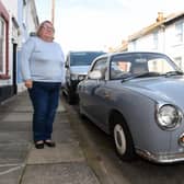 Louise Purcell, 56, of Adames Road, Fratton, are becoming frustrated after a vintage car has been parked in their road for two years
Picture: Sarah Standing (191022-4919)
