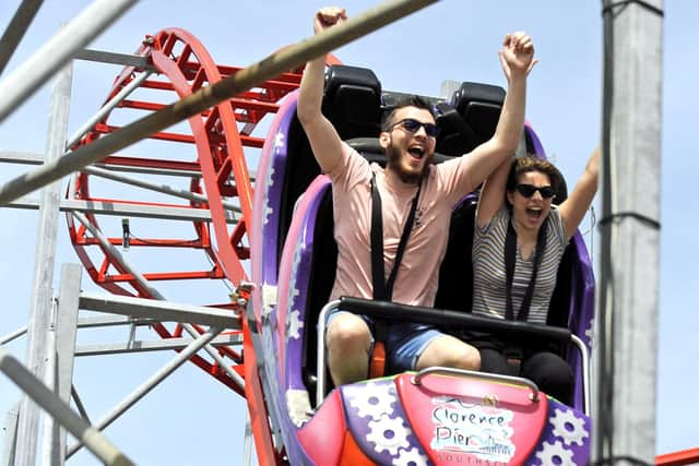 Vini Enculescu amnd his sister Abi from Londo enjoy one of the ride at Clarence Pier.  [07553067405]

Picture Ian Hargreaves (180720-1)