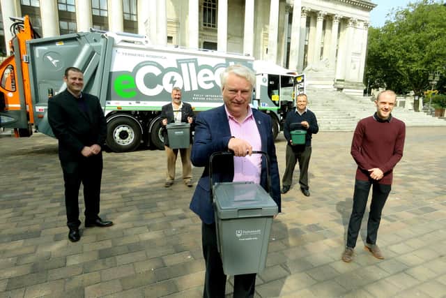 Left to right: Cllr Dave Ashmore, Cabinet Member for Environment & Climate Change; Cllr Lee Hunt, Cabinet Member for Community Safety; Cllr Gerald Vernon-Jackson, Leader of Portsmouth City Council; Cllr Darren Sanders, Cabinet Member for Housing and Preventing Homelessness; Cllr Matthew Winnington, Cabinet Member for Health, Wellbeing and Social Care with the electric bin. Picture: Portsmouth City Council
