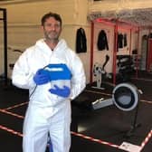 Simon Poland, of Portchester, pictured deep cleaning Renegades Gym in Copnor