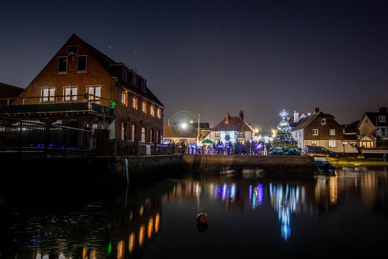 Emsworth's Christmas Lights will be switched on during a festive celebration on Friday, December 1 which will feature community carol singing, and a Father Christmas grotto at Emsworth Slipper Sailing Club.

Pictured is last year's display as seen from Emsworth Harbour.
Picture: Habibur Rahman