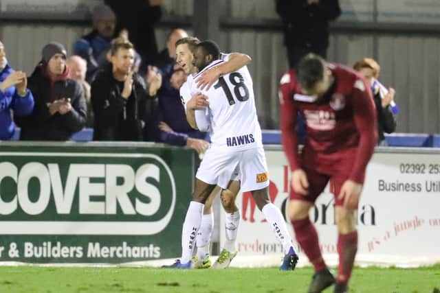 Wes Fogden and Bedsente Gomis celebrate Hawks' winner against Slough. Photo by Dave Haines