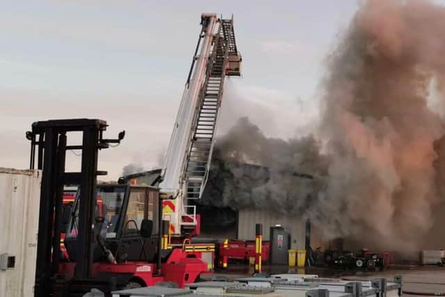 Aerial ladder platforms have been called to help firefighters tackle the blaze. Picture: Stuart Vaizey