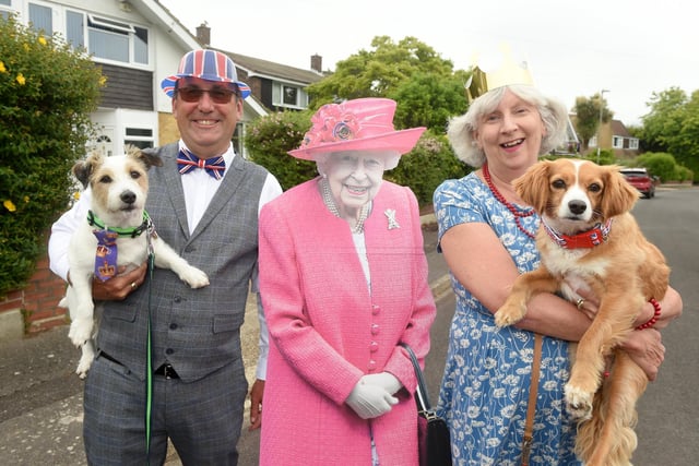 Residents of Eastcliff Close, Lee-on-the-Solent, held a street party on Sunday, June 5, to celebrate The Queen's Platinum Jubilee.
Pictured is: Cordell Batten (60) with Arthur the Jack Russell and Liz Roberts (63) wit Cavalier cross Ruby.
Picture: Sarah Standing (050622-9581)