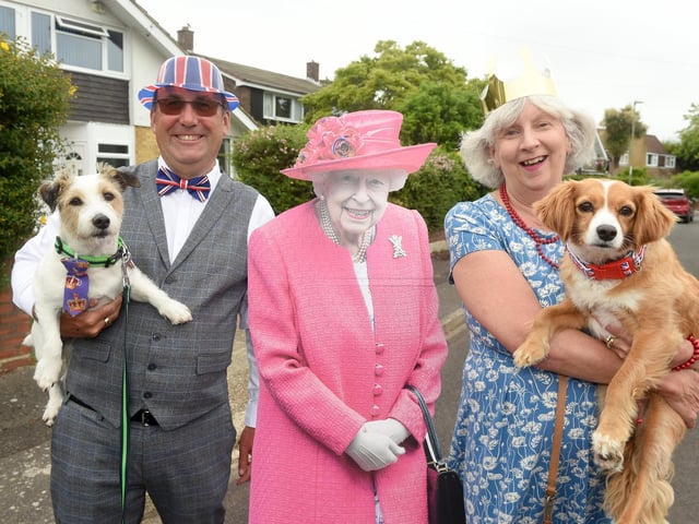 Residents of Eastcliff Close, Lee-on-the-Solent, held a street party on Sunday, June 5, to celebrate The Queen's Platinum Jubilee.
Pictured is: Cordell Batten (60) with Arthur the Jack Russell and Liz Roberts (63) wit Cavalier cross Ruby.
Picture: Sarah Standing (050622-9581)