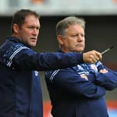 Former Pompey striker and Crawley assistant Lee Bradbury with boss John Yems.