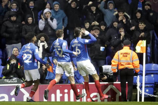 Christian Burgess scored his 12th Pompey goal in Friday night's 3-0 victory over Rochdale. Photo: Barry Zee