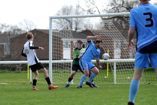 Portchester U23s about to concede an own goal during their 2-0 loss at Hayling United. Picture: Allan Hutchings