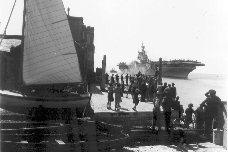 Portsmouth harbour entrance with an aircraft carrier somewhere between 1937 - 1940