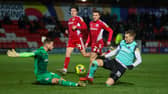 Joe Pigott was sent off for this challenge on Accrington goalkeeper Toby Savin on Tuesday night