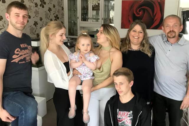  Sandy O'Neill, CEO of Citizens Advice Portsmouth with her family.