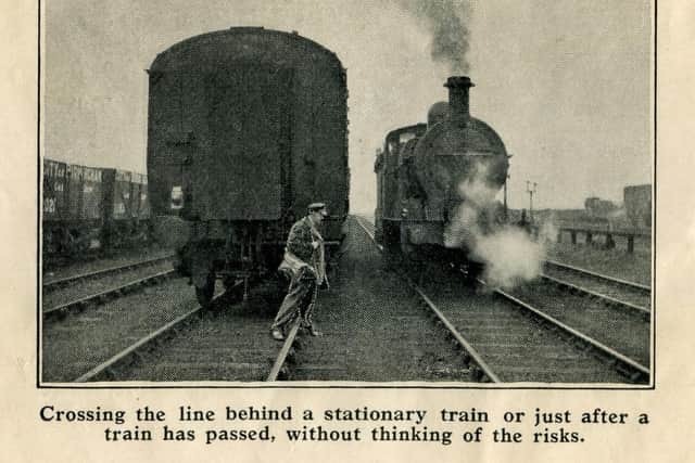 A 1930s staged staff safety image which shows the type of accident that staff had on the railways.