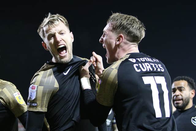 Joe Pigott celebrates after scoring Pompey's second in the 2-0 win at Fleetwood - just five minutes having come off the bench. Picture: Craig Galloway/ProSportsImages