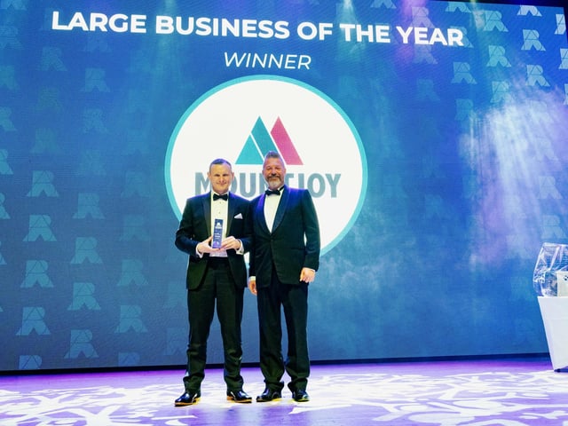 Mark Collins, of Nation Radio, hands the Large Business of the Year award to Mountjoy Ltd's managing director, Simon Ingram.   Picture: Keith Woodland (270321-257)