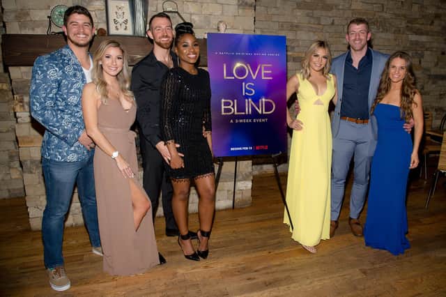 (L-R) Matt Barnett, Amber Pike, Cameron Hamilton, Lauren Speed, Giannina Gibelli, Damian Powers, and Kelly Chase from Netflix's Love is Blind (Photo by Marcus Ingram/Getty Images for Netflix)