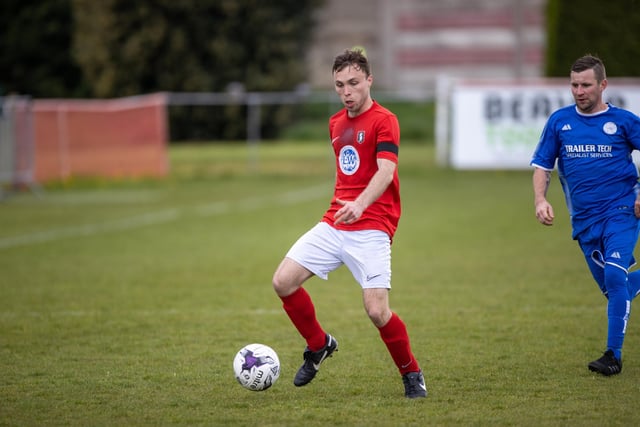 Action from Gosport Town's 4-0 victory over Lee Rangers (blue kit) in the Portsmouth & District FA Trophy final at Cams Alders. Picture: Alex Shute