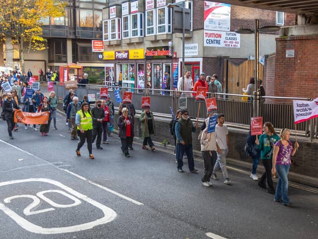 Cop 27 protestors march towards Commercial Road. Picture: Mike Cooter (121122)
