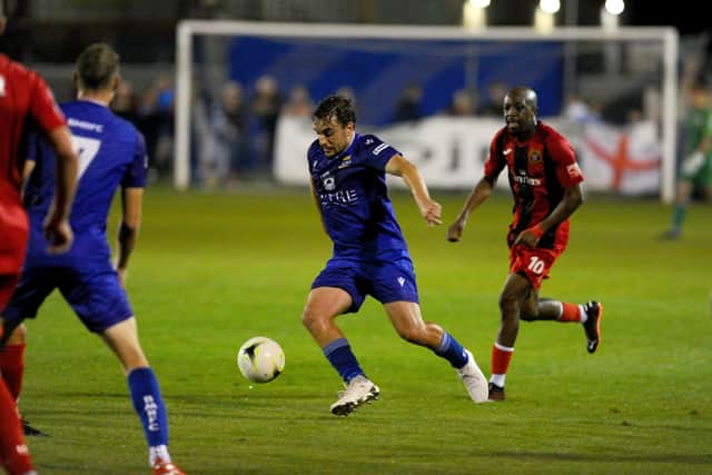 Baffins' Rob Evans in FA Cup action against Winchester City. Picture: Sarah Standing