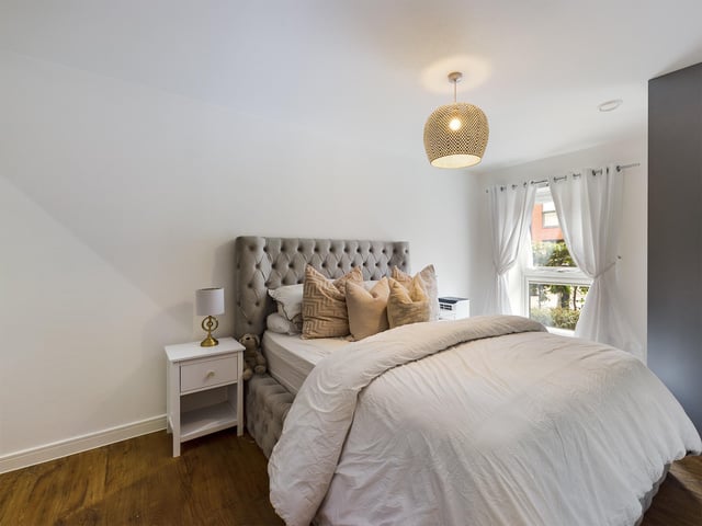 The property features three bedrooms, one of which is currently being as a home office.